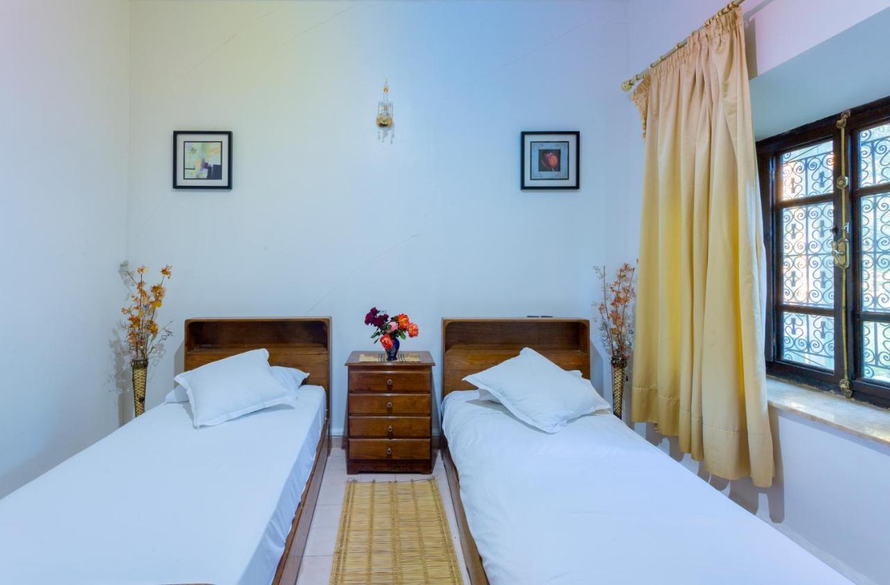 Oussari Quarto em Acomodações Particulares